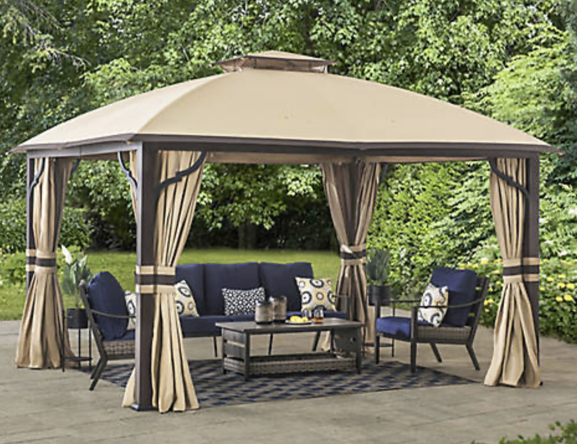 Brown and beige 12' x 10' Fabric Top Gazebo with screen and privacy curtain